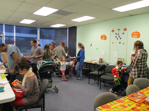 All of the families are busy making story baskets